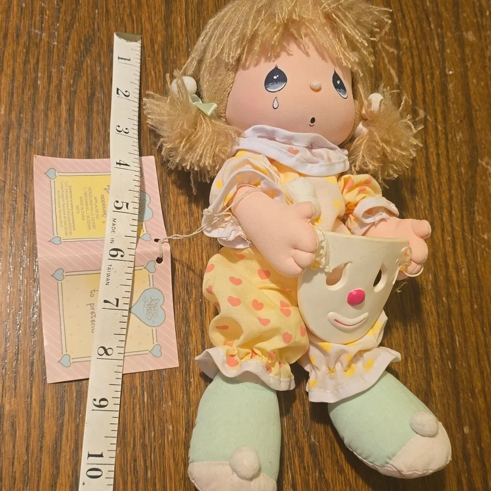 Adorable Precious Moments Doll in Yellow Jumper With Mask.